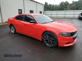 2019 Dodge Charger SXT with VIN 2C3CDXBG2KH504945, listed as a Copart auction lot 87117395 with 115,128 mi miles and Clean title. Bid and sale history available at DreamBid. Image 4.