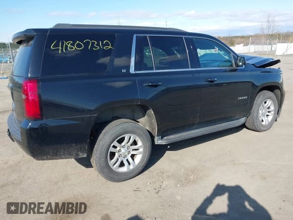 ✅ 2018 Chevrolet Tahoe LT • VIN: 1GNSKBKC8JR302016 • Lot: 41807312. Listed on IAAI with 115,031 mi. Free auction sales archive from the USA and detailed vehicle history report at DreamBid. Image 4.