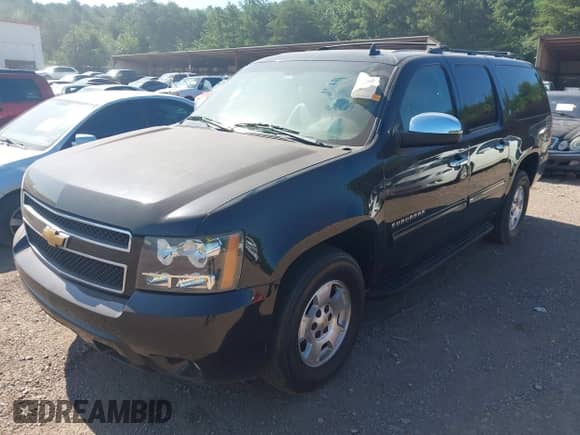 2014 Chevrolet Suburban LT z VIN 1GNSCJE05ER121390, wystawiony jako IAAI lot #42684312 z przebiegiem 283 608 mil mil oraz . Historia ofert i sprzedaży dostępna na DreamBid. Obrazek 17.