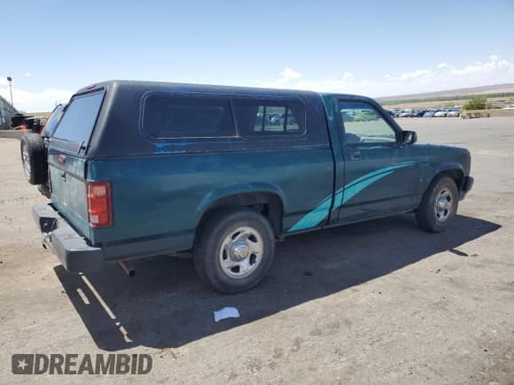 1995 Dodge Dakota with VIN 1B7FL26G5SW949027, listed as a Copart auction lot 54697345 with 140,475 mi miles and Clean title. Bid and sale history available at DreamBid. Image 3.
