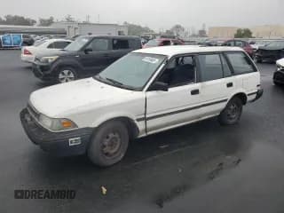 ✅ 1992 Toyota Corolla • VIN: JT2AE94K4N3500103 • Lot: 93150605. Listed on Copart with 330,269 mi. Free auction sales archive from the USA and detailed vehicle history report at DreamBid. Image 1.