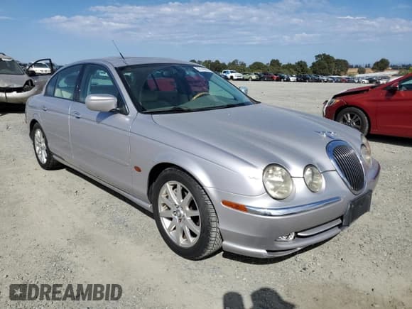 ✅ 2000 Jaguar S-Type V6 • VIN: SAJDA01C3YFL56069 • Лот: 82149685. Опубликован ранее на Copart с пробегом 143 092 миль. Бесплатный доступ к архиву аукционных продаж из США и подробный отчёт об истории автомобиля на DreamBid. Изображение 4.