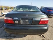 ✅ 2002 Mazda 626 LX • VIN: 1YVGF22C625265716 • Лот: 57782315. Опубликован ранее на Copart с пробегом 149 002 миль. Бесплатный доступ к архиву аукционных продаж из США и подробный отчёт об истории автомобиля на DreamBid. Изображение 6.