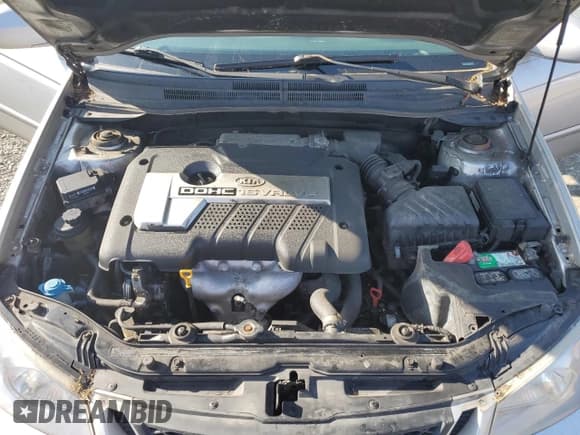 ✅ 2005 Kia Spectra • VIN: KNAFE161355121968 • Lot: 54621465. Listed on Copart with 221,951 mi. Free auction sales archive from the USA and detailed vehicle history report at DreamBid. Image 12.