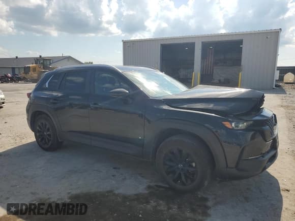 ✅ 2024 Mazda CX-50 S Premium • VIN: 7MMVABDM0RN176087 • Lot: 66379335. Listed on Copart with 36,480 mi. Free auction sales archive from the USA and detailed vehicle history report at DreamBid. Image 4.