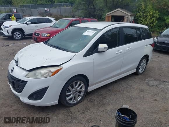 ✅ 2013 Mazda 5 Touring • VIN: JM1CW2CL7D0149735 • Лот: 43142042. Опубликован ранее на IAAI с пробегом 120 488 миль. Бесплатный доступ к архиву аукционных продаж из США и подробный отчёт об истории автомобиля на DreamBid. Изображение 2.
