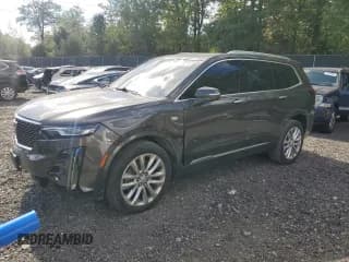 ✅ 2020 Cadillac XT6 AWD Premium Luxury • VIN: 1GYKPDRS7LZ173279 • Lot: 85678145. Wystawiony na Copart z przebiegiem 47 574 mil. Bezpłatny archiwum sprzedaży aukcyjnych z USA i szczegółowy raport historii pojazdu na DreamBid. Zdjęcie 1.