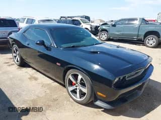 2013 Dodge Challenger SRT-8 with VIN 2C3CDYCJ3DH587739, listed as a IAAI auction lot 43148385 with 60,177 mi miles and . Bid and sale history available at DreamBid. Image 1.