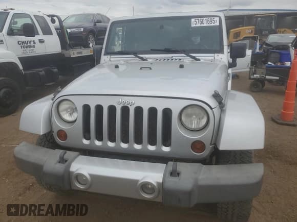 ✅ 2010 Jeep Wrangler Sahara • VIN: 1J4GA5D18AL182858 • Lot: 57601695. Listed on Copart with Not provided. Free auction sales archive from the USA and detailed vehicle history report at DreamBid. Image 5.