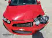 2014 Chevrolet Sonic LS z VIN 1G1JA5SH6E4128074, wystawiony jako Copart lot #69489934 z przebiegiem 104 912 mil mil oraz Szkoda całkowita • Salvage title. Historia ofert i sprzedaży dostępna na DreamBid. Obrazek 11.