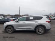 ✅ 2019 Hyundai Santa Fe SE • VIN: 5NMS2CAD7KH054274 • Lot: 43694931. Listed on IAAI with 96,329 mi. Free auction sales archive from the USA and detailed vehicle history report at DreamBid. Image 14.