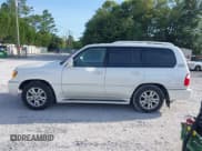 ✅ 2005 Lexus LX 470 • VIN: JTJHT00W754000878 • Lot: 42727042. Wystawiony na IAAI z przebiegiem 263 799 mil. Bezpłatny archiwum sprzedaży aukcyjnych z USA i szczegółowy raport historii pojazdu na DreamBid. Zdjęcie 14.