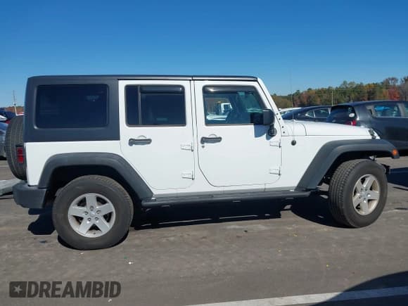 ✅ 2016 Jeep Wrangler Unlimited Sport • VIN: 1C4BJWDG2GL215338 • Lot: 43606726. Listed on IAAI with 103,330 mi. Free auction sales archive from the USA and detailed vehicle history report at DreamBid. Image 14.