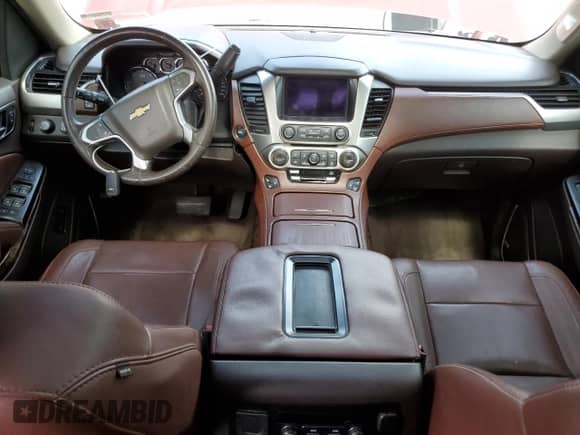 2015 Chevrolet Tahoe LTZ z VIN 1GNSKCKC4FR277564, wystawiony jako Copart lot #60589335 z przebiegiem Nie podano mil oraz Szkoda całkowita • Salvage title. Historia ofert i sprzedaży dostępna na DreamBid. Obrazek 8.