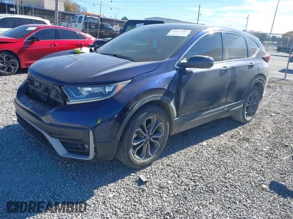 ✅ 2020 Honda CR-V EX-L • VIN: 2HKRW1H8XLH415825 • Lot: 43697303. Listed on IAAI with 128,863 mi. Free auction sales archive from the USA and detailed vehicle history report at DreamBid. Image 2.