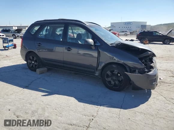 ✅ 2007 Kia Rondo LX • VIN: KNAFG525X77073080 • Lot: 85082355. Listed on Copart with 133,484 mi. Free auction sales archive from the USA and detailed vehicle history report at DreamBid. Image 4.