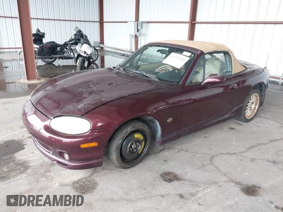 ✅ 2000 Mazda MX-5 Miata • VIN: JM1NB3535Y0145017 • Лот: 42721251. Опубликован ранее на IAAI с пробегом Не указан. Бесплатный доступ к архиву аукционных продаж из США и подробный отчёт об истории автомобиля на DreamBid. Изображение 2.