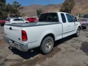 ✅ 1999 Ford F-150 • VIN: 1FTRX17W7XKA64389 • Lot: 42923315. Wystawiony na IAAI z przebiegiem 345 208 mil. Bezpłatny archiwum sprzedaży aukcyjnych z USA i szczegółowy raport historii pojazdu na DreamBid. Zdjęcie 4.