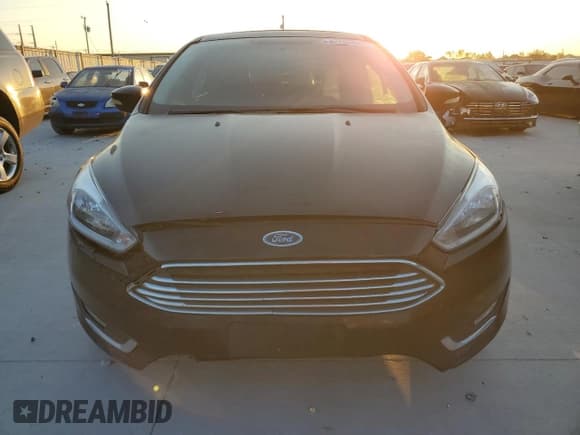 ✅ 2018 Ford Focus Titanium • VIN: 1FADP3N24JL283274 • Лот: 82455005. Опубликован ранее на Copart с пробегом 163 477 миль. Бесплатный доступ к архиву аукционных продаж из США и подробный отчёт об истории автомобиля на DreamBid. Изображение 5.