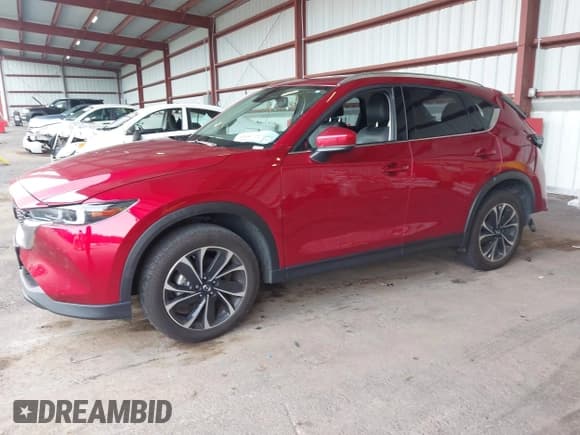✅ 2023 Mazda CX-5 S Premium • VIN: JM3KFBDM3P0157765 • Лот: 43314611. Опубликован ранее на IAAI с пробегом 51 238 миль. Бесплатный доступ к архиву аукционных продаж из США и подробный отчёт об истории автомобиля на DreamBid. Изображение 17.
