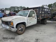 ✅ 1999 GMC Sierra 1500 • VIN: 1GDJC34R3XF087014 • Lot: 86367084. Wystawiony na Copart z przebiegiem 94 539 mil. Bezpłatny archiwum sprzedaży aukcyjnych z USA i szczegółowy raport historii pojazdu na DreamBid. Zdjęcie 1.