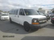 ✅ 2014 Chevrolet Express Passenger 1LS • VIN: 1GAZGZFAXE1105162 • Lot: 72773154. Listed on Copart with 97,950 mi. Free auction sales archive from the USA and detailed vehicle history report at DreamBid. Image 4.