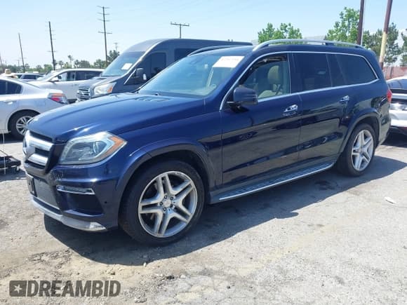 ✅ 2015 Mercedes-Benz GL 550 • VIN: 4JGDF7DE4FA447377 • Лот: 42267454. Опубликован ранее на IAAI с пробегом 164 738 миль. Бесплатный доступ к архиву аукционных продаж из США и подробный отчёт об истории автомобиля на DreamBid. Изображение 2.