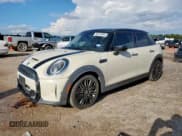 ✅ 2022 MINI Hardtop 4 Door Cooper S • VIN: WMW53DK01N2P74624 • Lot: 80210955. Listed on Copart with 58,063 mi. Free auction sales archive from the USA and detailed vehicle history report at DreamBid. Image 1.