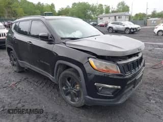 2021 Jeep Compass Latitude with VIN 3C4NJDBB6MT590092, listed as a IAAI auction lot 42351097 with 72,428 mi miles and . Bid and sale history available at DreamBid. Image 1.