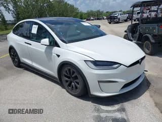 ✅ 2022 Tesla Model X • VIN: 7SAXCDE57NF343580 • Lot: 41709207. Wystawiony na IAAI z przebiegiem Nie podano. Bezpłatny archiwum sprzedaży aukcyjnych z USA i szczegółowy raport historii pojazdu na DreamBid. Zdjęcie 1.