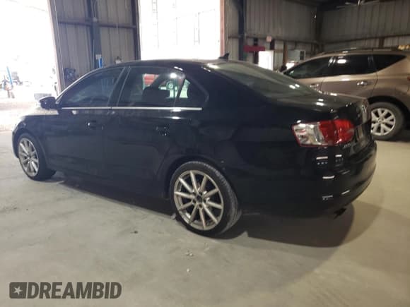 ✅ 2013 Volkswagen Jetta TDI w/Premium/Nav • VIN: 3VW3L7AJ2DM292383 • Lot: 66886315. Listed on Copart with 193,519 mi. Free auction sales archive from the USA and detailed vehicle history report at DreamBid. Image 2.