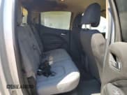 ✅ 2018 Chevrolet Colorado 2WD LT • VIN: 1GCGSCEN2J1186702 • Лот: 63804834. Опубликован ранее на Copart с пробегом 95 436 миль. Бесплатный доступ к архиву аукционных продаж из США и подробный отчёт об истории автомобиля на DreamBid. Изображение 10.