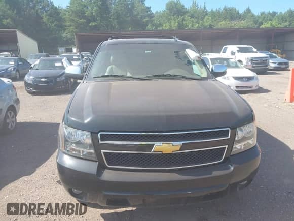 2014 Chevrolet Suburban LT z VIN 1GNSCJE05ER121390, wystawiony jako IAAI lot #42684312 z przebiegiem 283 608 mil mil oraz . Historia ofert i sprzedaży dostępna na DreamBid. Obrazek 12.