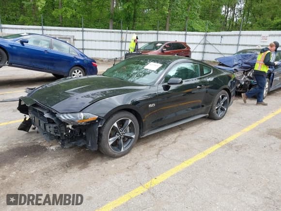 ✅ 2022 Ford Mustang GT • VIN: 1FA6P8CF5N5145653 • Lot: 42370652. Listed on IAAI with 24,987 mi. Free auction sales archive from the USA and detailed vehicle history report at DreamBid. Image 2.