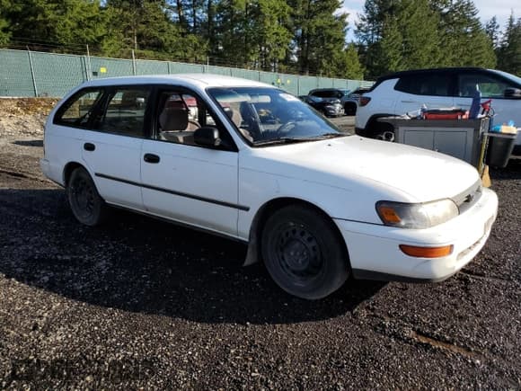 ✅ 1993 Toyota Corolla • VIN: JT2AE09W5P0029686 • Lot: 47847195. Listed on Copart with 203,846 mi. Free auction sales archive from the USA and detailed vehicle history report at DreamBid. Image 4.