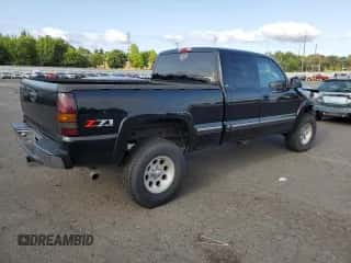 2000 Chevrolet Silverado 1500 LT z VIN 2GCEK19T9Y1375842, wystawiony jako Copart lot #64787384 z przebiegiem 242 729 mil mil oraz Szkoda całkowita • Salvage title. Historia ofert i sprzedaży dostępna na DreamBid. Obrazek 3.