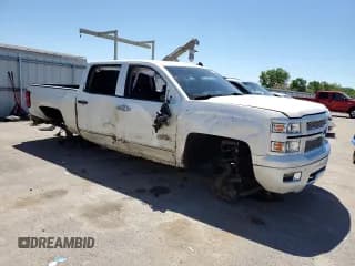 ✅ 2014 Chevrolet Silverado 1500 High Country • VIN: 3GCUKTEJ2EG450282 • Лот: 52665544. Опубликован ранее на Copart с пробегом Не указан. Бесплатный доступ к архиву аукционных продаж из США и подробный отчёт об истории автомобиля на DreamBid. Изображение 4.