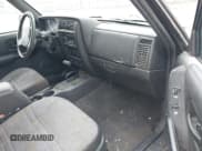 ✅ 1999 Jeep Cherokee Sport • VIN: 1J4FF68S0XL626507 • Лот: 41584988. Опубликован ранее на IAAI с пробегом 301 356 миль. Бесплатный доступ к архиву аукционных продаж из США и подробный отчёт об истории автомобиля на DreamBid. Изображение 5.