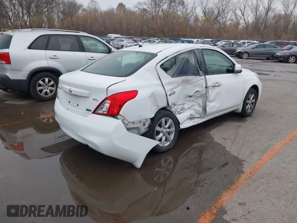 ✅ 2012 Nissan Versa SV • VIN: 3N1CN7AP5CL909221 • Лот: 43763639. Опубликован ранее на IAAI с пробегом 127 193 миль. Бесплатный доступ к архиву аукционных продаж из США и подробный отчёт об истории автомобиля на DreamBid. Изображение 4.