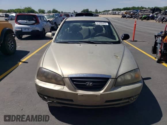 2005 Hyundai Elantra GLS z VIN KMHDN46D35U149616, wystawiony jako Copart lot #81009975 z przebiegiem 233 904 mil mil oraz Szkoda całkowita • Salvage title. Historia ofert i sprzedaży dostępna na DreamBid. Obrazek 5.