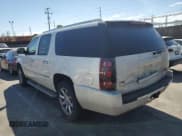 ✅ 2010 GMC Yukon XL Denali • VIN: 1GKUKMEF7AR262552 • Lot: 81643585. Listed on Copart with 168,241 mi. Free auction sales archive from the USA and detailed vehicle history report at DreamBid. Image 2.