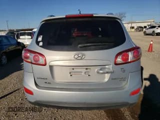 ✅ 2010 Hyundai Santa Fe Limited • VIN: 5NMSK3AB6AH367359 • Lot: 87106334. Listed on Copart with 186,886 mi. Free auction sales archive from the USA and detailed vehicle history report at DreamBid. Image 6.