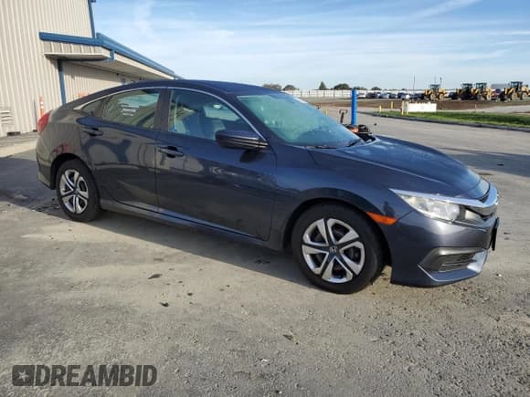 ✅ 2017 Honda Civic LX • VIN: 19XFC2F5XHE219082 • Lot: 92332275. Wystawiony na Copart z przebiegiem 78 440 mil. Bezpłatny archiwum sprzedaży aukcyjnych z USA i szczegółowy raport historii pojazdu na DreamBid. Zdjęcie 4.