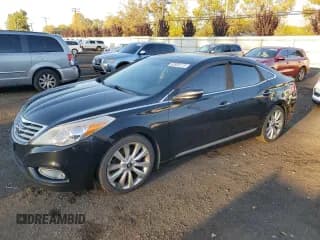 ✅ 2013 Hyundai Azera • VIN: KMHFH4JG7DA277438 • Лот: 82655115. Опубликован ранее на Copart с пробегом 187 449 миль. Бесплатный доступ к архиву аукционных продаж из США и подробный отчёт об истории автомобиля на DreamBid. Изображение 1.