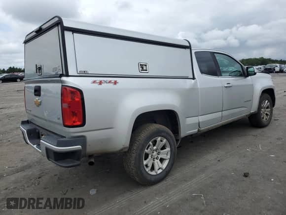 2019 Chevrolet Colorado 4WD LT with VIN 1GCHTCEA6K1345544, listed as a Copart auction lot 69826284 with 202,306 mi miles and Salvage title. Bid and sale history available at DreamBid. Image 3.