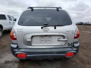 2003 Hyundai Santa Fe GLS с VIN KM8SC13D33U450903, выставлен на аукционе Copart как лот 48351575 с пробегом 150 319 миль миль и Списание • Salvage title. История ставок и продаж доступна на DreamBid. Изображение 6.