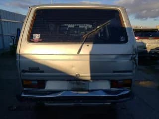 ✅ 1986 Volkswagen Vanagon • VIN: WV2YB0257GH097667 • Lot: 82383524. Wystawiony na Copart z przebiegiem 176 022 mil. Bezpłatny archiwum sprzedaży aukcyjnych z USA i szczegółowy raport historii pojazdu na DreamBid. Zdjęcie 6.