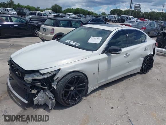 ✅ 2014 Infiniti Q50 Premium • VIN: JN1BV7APXEM674609 • Лот: 42501051. Опубликован ранее на IAAI с пробегом 93 998 миль. Бесплатный доступ к архиву аукционных продаж из США и подробный отчёт об истории автомобиля на DreamBid. Изображение 2.