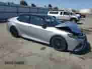 2021 Toyota Camry Hybrid XSE с VIN 4T1K31AK3MU021277, выставлен на аукционе Copart как лот 70713925 с пробегом 110 295 миль миль и Списание • Salvage title. История ставок и продаж доступна на DreamBid. Изображение 4.