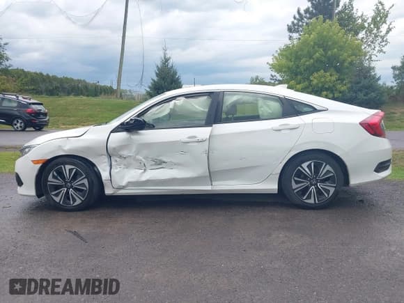 ✅ 2018 Honda Civic EX-T • VIN: JHMFC1F3XJX002306 • Lot: 43149201. Listed on IAAI with 77,470 mi. Free auction sales archive from the USA and detailed vehicle history report at DreamBid. Image 14.